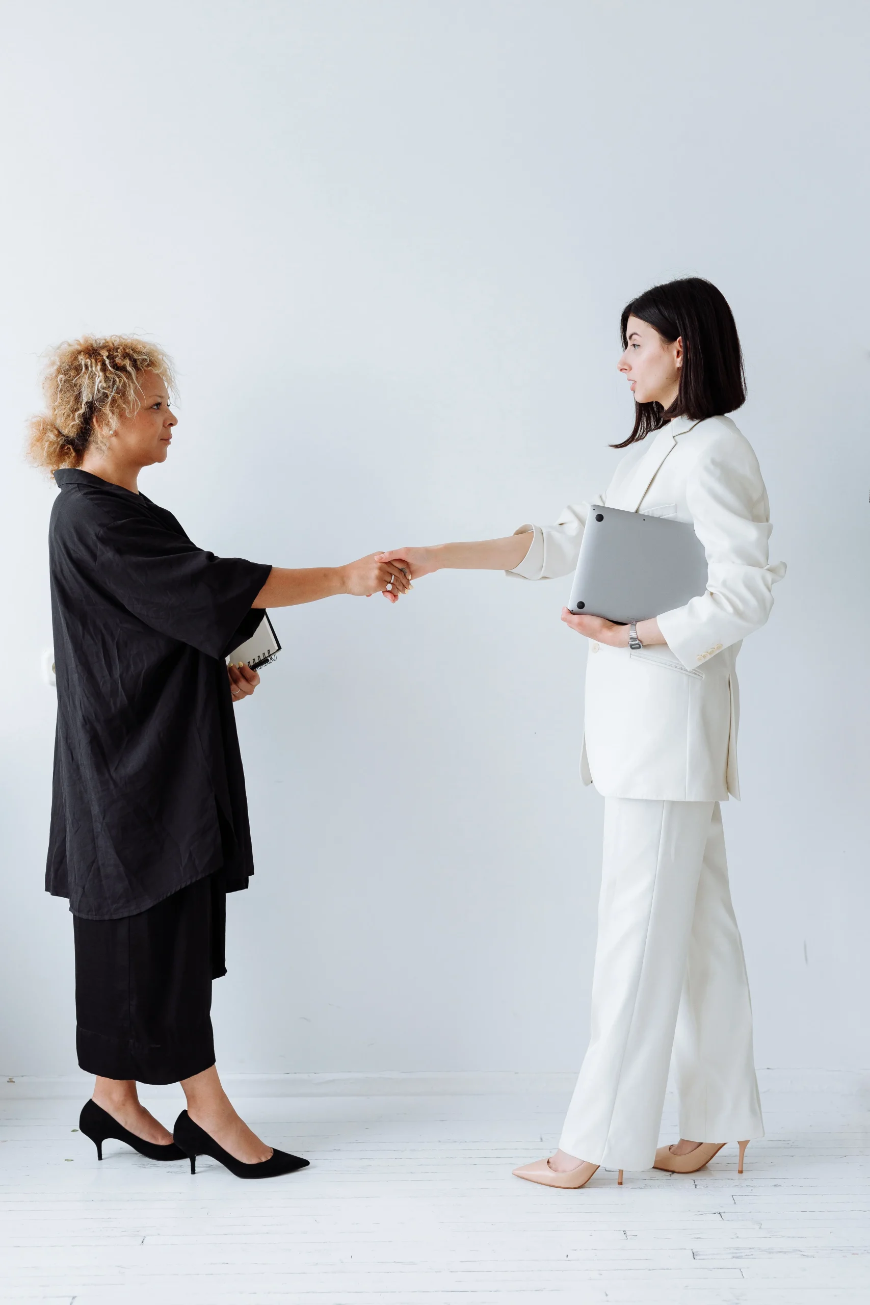 two person shake hands to each other